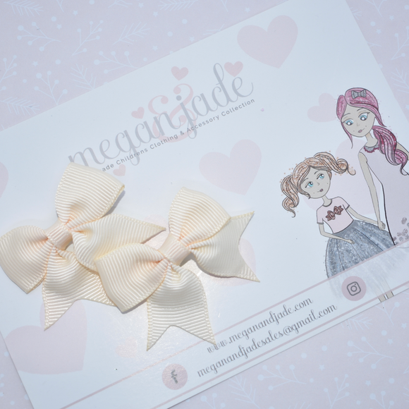 Pair of Ivory Mini Bow Clips